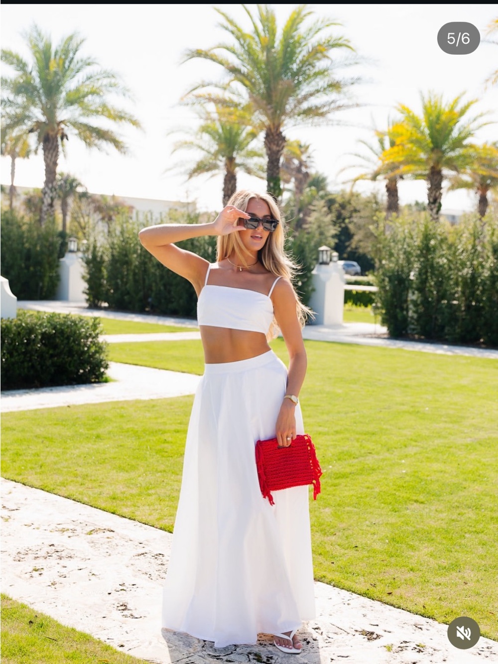 White Two-Piece Crop Top and Maxi Skirt Set with Red Clutch